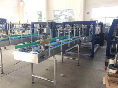 China Automatische Plastikfilm-Hitze-Schrumpfverpackungs-Maschine für HAUSTIER Wasser-Flasche zu verkaufen