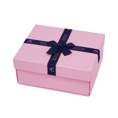 China ISO9001 Matte Lamination Pink Flat Packed Gift Box With Bow Ornament 20*18*7.7cm for sale