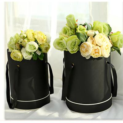 China Cylindrical Black Hat Box Bouquet Customized With Lid And Handle for sale