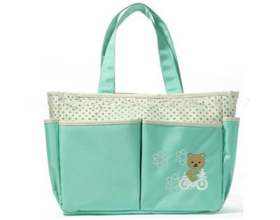 China Light Green Fabric Cute Stylish Baby Changing Bags Embroidery logo on front for sale