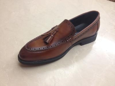 China Tassel Bullock Hueco de los hombres vestimenta formal zapatos de ocio marrón Slip On vestimenta de zapatos en venta
