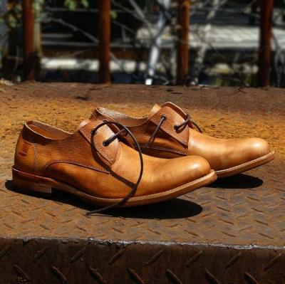 China Zapatos de hombre de cuero puro, zapatos de hombre de tiempo libre, botas de cuero hechas a mano en venta