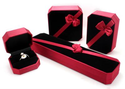 China Femal Red Plastic Jewelry Box PU Leather With Ribbon Environmentally Friendly for sale