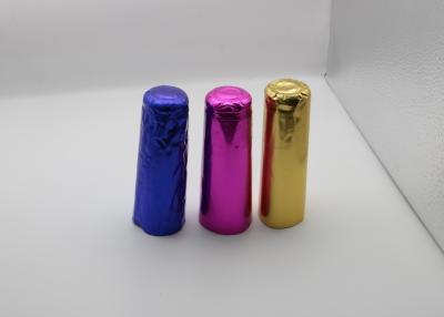 China Customize PVC Heat Shrink Caps Seal For Champagne Wine Liquor Bottle Cap Shrink Wrap With Tear Stripe for sale