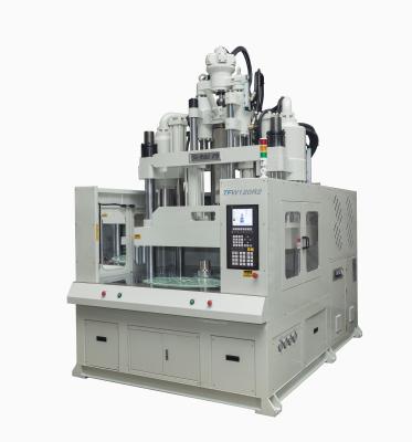 China Accurate And Efficient 120 Ton Vertical Rotary Table Injection Molding Machine For Auto Parts Plastic Product for sale