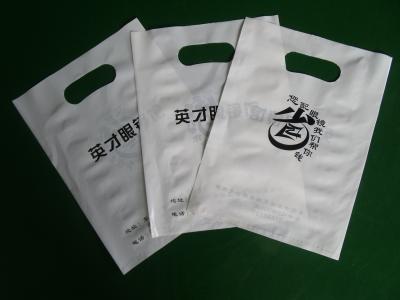 China HDPE Custom Printed Die Cut Handle Bags Regenerative Plastic for sale
