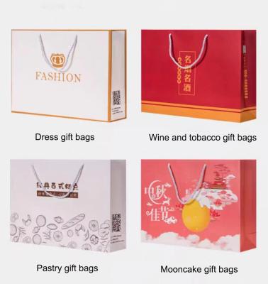 China Degradable Paper Poly Bag Tearproof Paper Plastic Packaging Bag And Gift Box for sale