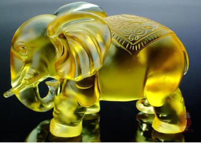 China Amber Colored Glaze Indoor Home Decoration Elephants Figurine Statue 135*80*115mm for sale