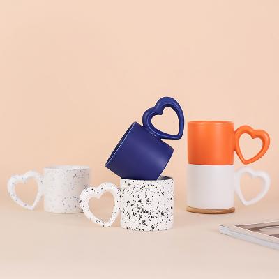 China Matte Nordic Style Ceramic Coffee Cups Mug With Heart Shape Handle for sale