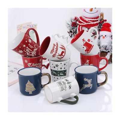 China Christmas Ceramic Coffee Cups With Cute Cartoon Snowman Santa Claus Pattern for sale