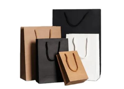China Luxury Custom Printed Your Own Logo White Brown Craft Shopping Paper Bag With Handles en venta