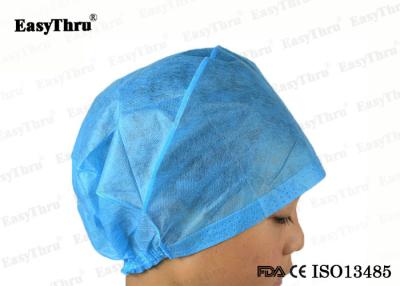 China Vestido de protección ISO azul, gorra quirúrgica estéril desechable en venta