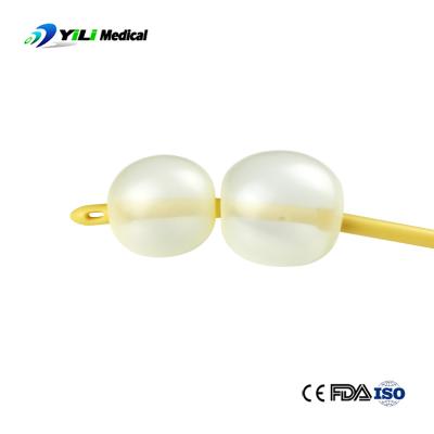 China Sterile Latex Foley Catheter Triple Way 40cm Catheter with Valve Feature for sale