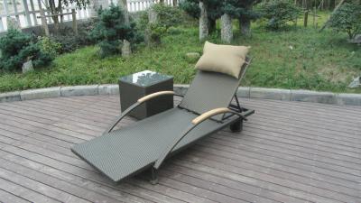 China Modern Rattan Sun Lounger , Folding Lounger With Side Tea Table for sale