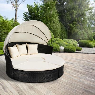 中国 円形の屋外の藤の寝台兼用の長椅子の大きい日よけが付いている柳細工の庭の寝台兼用の長椅子 販売のため