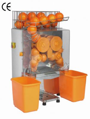 中国 ステンレス鋼の食品加工の機械類のキャビネットが付いているオレンジ ジューサー機械 販売のため