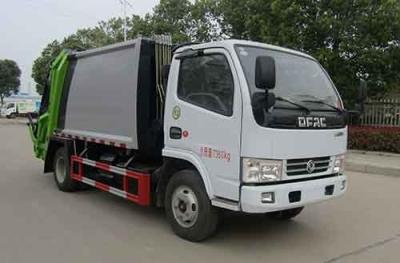 China 4x2 129hp camión compactador de basura camión de basura 7360kg en venta