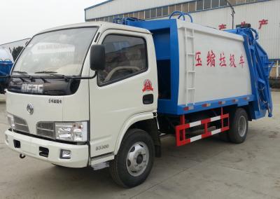 China 5.5 Cbm Fuel Type Trash Dump Truck Garbage Tipper With Rear Loader for sale