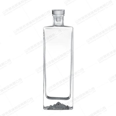 China Engraved Mountain Bottom Cork 500ml Vodka Glass Bottle for Mountain Artisanal Spirits for sale