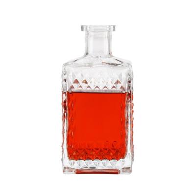 China Customied Square Carved Glass Reed Diffuser Bottles with Whiskey Vodka Wine Bottle Color for sale