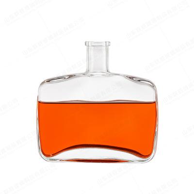 China Glass Whiskey Vodka Bourbon Brandy Bottle With Big Capacity And Flat Arch Bridge for sale
