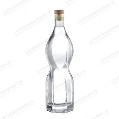 China Unique Design Glass Liquor Bottle with Hexagonal Prism Shape and Customized Design for sale