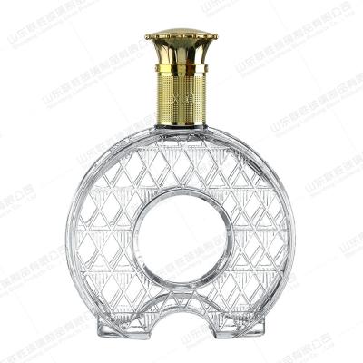 China Customized Round 750ml Wine Decanter Glass Bottle with Fine Carved Art and Cork Stoppers for sale