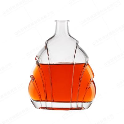 China Exquisite Carving Crafts Glass Bottle for Hot Mountain Shape Whiskey Vodka Brandy for sale