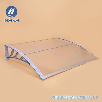 China Weather Resistance Polycarbonate PC Canopy Overhead Door Window Awning for sale
