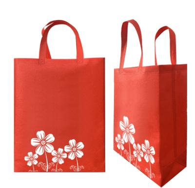 China Red Non Woven Carry Bags 80g Non Woven Shopper Bags Customized en venta
