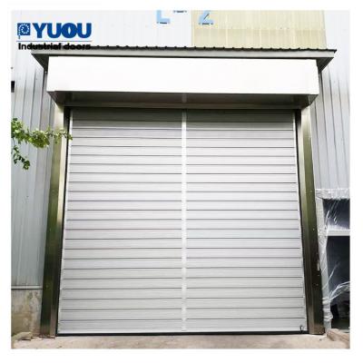 China Wind Resistance White Aluminium Front Door With Photocell Sensor And Emergency Devices for sale