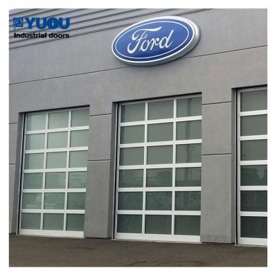 China Transparent PC Glass Sectional Garage Doors Automatic Aluminum Frame 410mm for sale