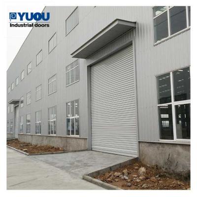 中国 ステンレス鋼のローラー シャッター ドア12mの風抵抗力がある電流を通された1.0KW 販売のため