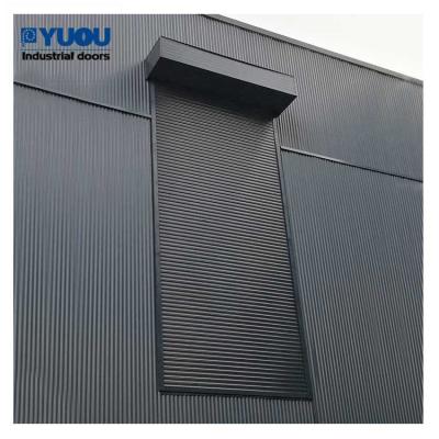 China Warehouse 12m Steel Automated Roller Shutter Doors Strong Windproof 1.2mm Slat for sale