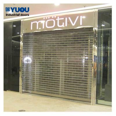 China PC Slat Polycarbonate Rolling Door 8m Width Transparent Roll Up Door With Motor for sale