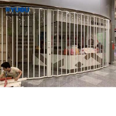 China Transparent Polycarbonate Folding Doors Roll Up Door Waterproof Largest for sale