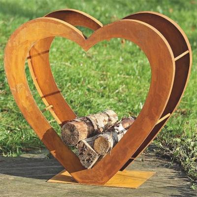 China Customized Rust Colored Heart Shaped Corten Metal Firewood Storage Log Rack for sale