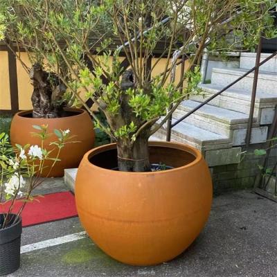 China Outdoor Geometric Spheres Corten Steel Globe Tree Planter Pots For Streetscape for sale
