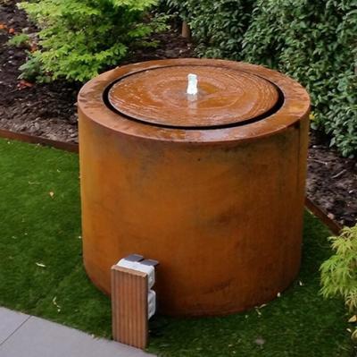 China Garden Metal Ornaments Fountain Corten Steel Round Water Table Feature for sale