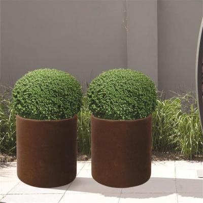 China 800mm Decorative Metal Garden Pots Cylindrical Corten Steel Planter Boxes for sale