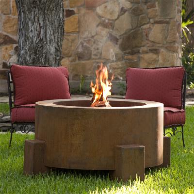 China Outdoor Heater Multi-function Round Metal Fire Pit Corten Steel Fire Table for sale