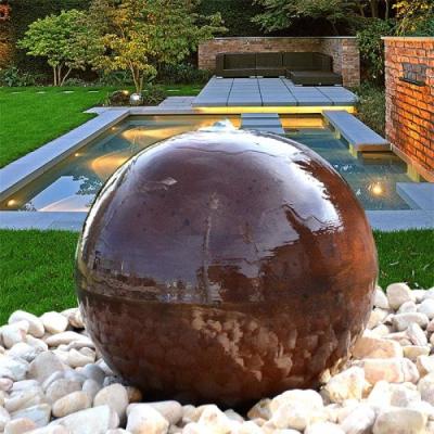 China Customized Exterior Decoration Sphere Shaped Rusty Corten Steel Water Feature for sale