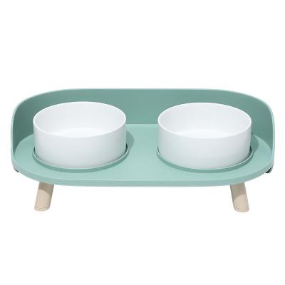 China pet dining table ceramic double bowl cat bowl to protect the cervical spine anti-overturning food bowl for sale