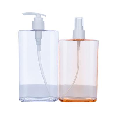China 500ml Orange Plastic Refillable Shampoo Bottles For Shower Gel for sale