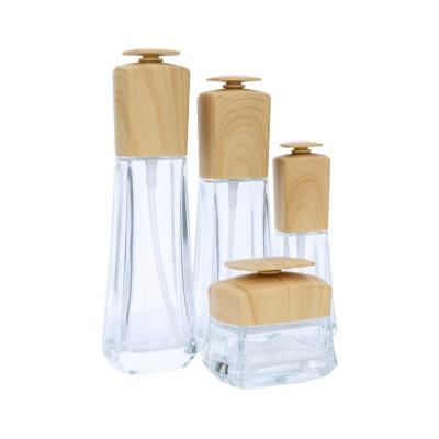 China Garrafa de cosméticos de vidro transparente de bambu Jar de cosméticos de bambu com tampa de bambu à venda