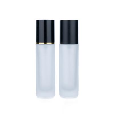 China 30ml Empty Foundation Bottle Simplicity Redefined Frosted Glass With Black Plastic Cap for sale