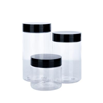China 60ml 120ml 150ml Cylindrical Transparent Plastic Cream Jars With Black Lids for sale