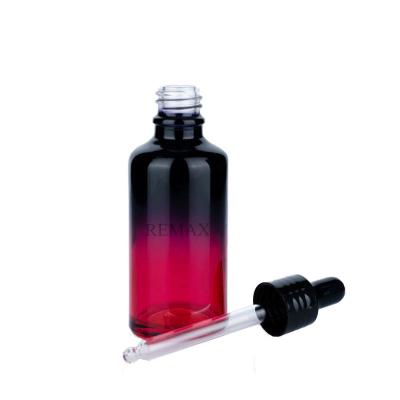 China Glass Cosmetic Dropper Bottles 30ml Round Clear Red Essential Oil Sample Bottles for sale