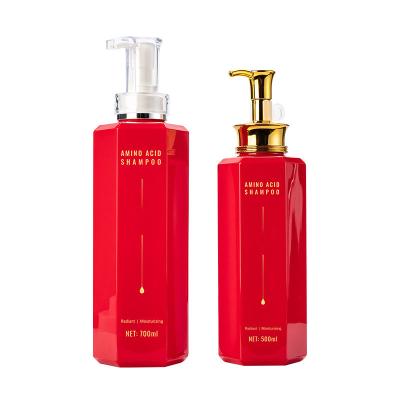 China Vibrant 700ml/500ml Red Shampoo Lotion Bottle With Luxurious Golden Pump Head à venda