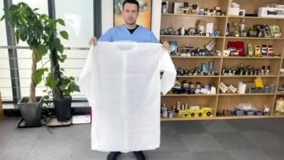 China S&J OEM Wholesale Nonwoven White Medical PP Cheap Disposable Surgery Lab Coats with Pockets for sale